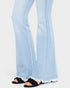 Light blue jeans with a white background