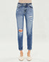 Blue distressed jeans on a white background