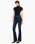 A model wearing a black short-sleeve mock neck top and dark blue high-waisted flare jeans, paired with black pointed flats, against a plain white studio background.