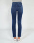 Blue jeans worn by a person on a white background