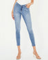 Light blue jeans worn by a person on a white background