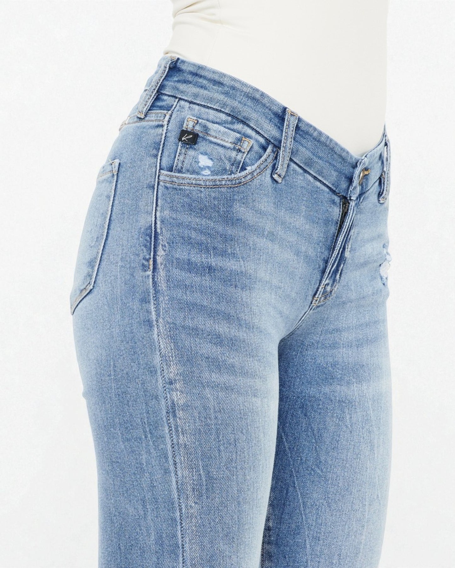 Light blue jeans on a white background