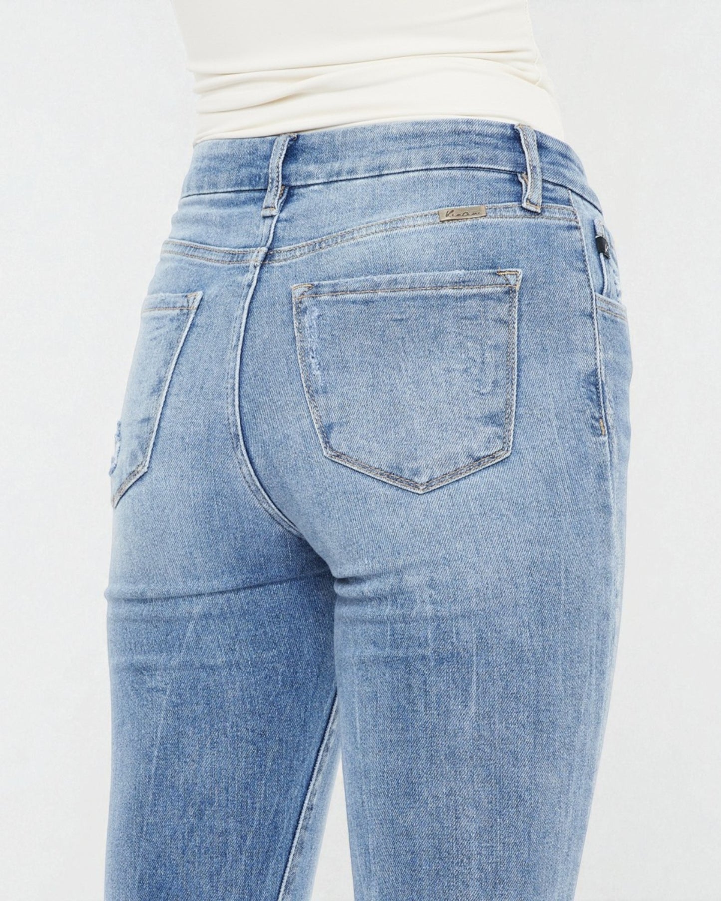 Light blue jeans on a white background