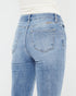 Light blue jeans on a white background