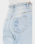 Light blue jeans with a brand label on a white background