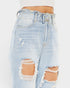 Light blue distressed denim shorts on a white background