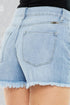 Light blue denim shorts with a frayed hem on a plain background