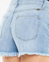 Close-up of the back of light-wash denim shorts with a frayed hem, showing the back pocket and waistband details.