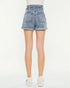Light blue acid-wash denim shorts worn by a person on a white background
