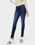 Blue jeans worn by a person on a white background