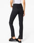 A model from the waist down wearing black pinstriped trousers with side slits, styled with black slide sandals against a plain white studio background.