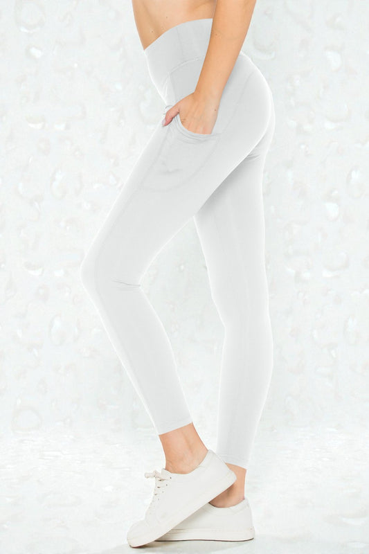 White pants worn by a person on a textured white background
