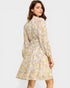 Woman wearing a floral dress on a white background