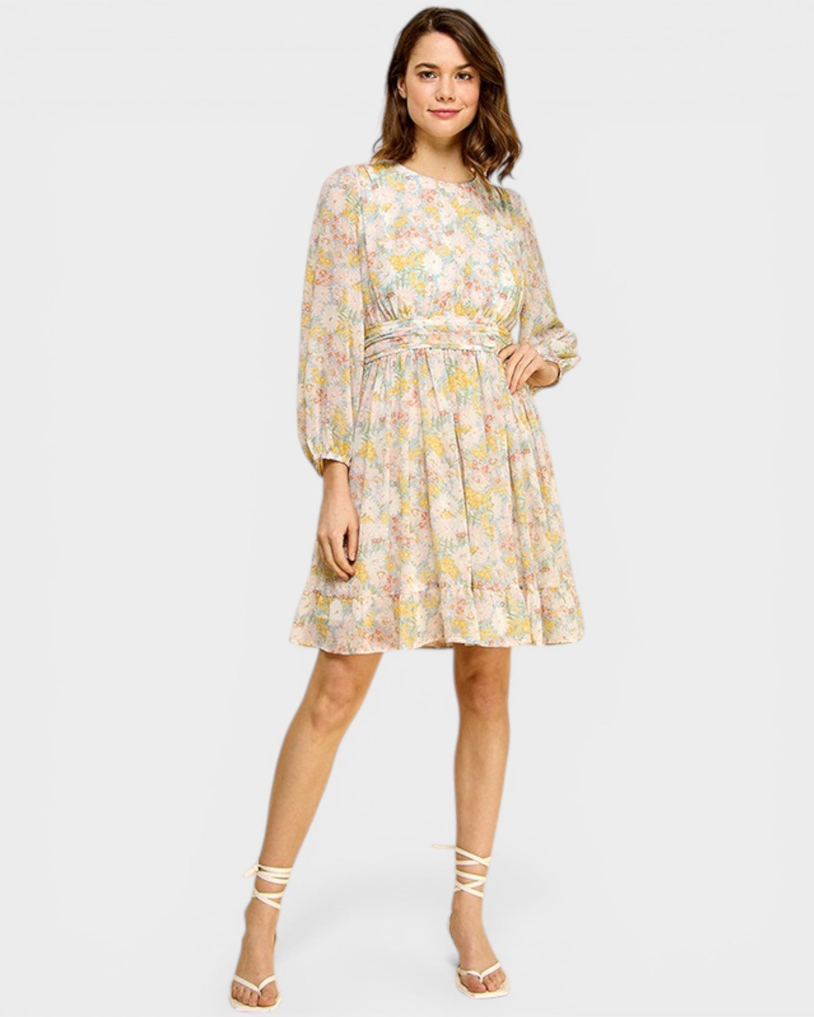 Woman wearing a floral dress on a white background