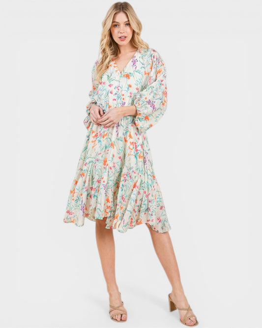 Woman wearing a floral dress on a white background