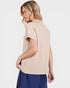 Woman wearing a beige short-sleeve top on a white background