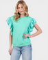 Woman wearing a mint green top with ruffled sleeves on a white background