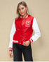 Person wearing a red and white varsity jacket with a letter 'B' on a beige background