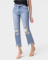 Light blue distressed jeans worn by a person on a white background