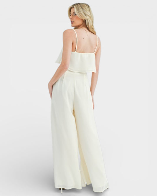 Woman wearing a white dress on a white background