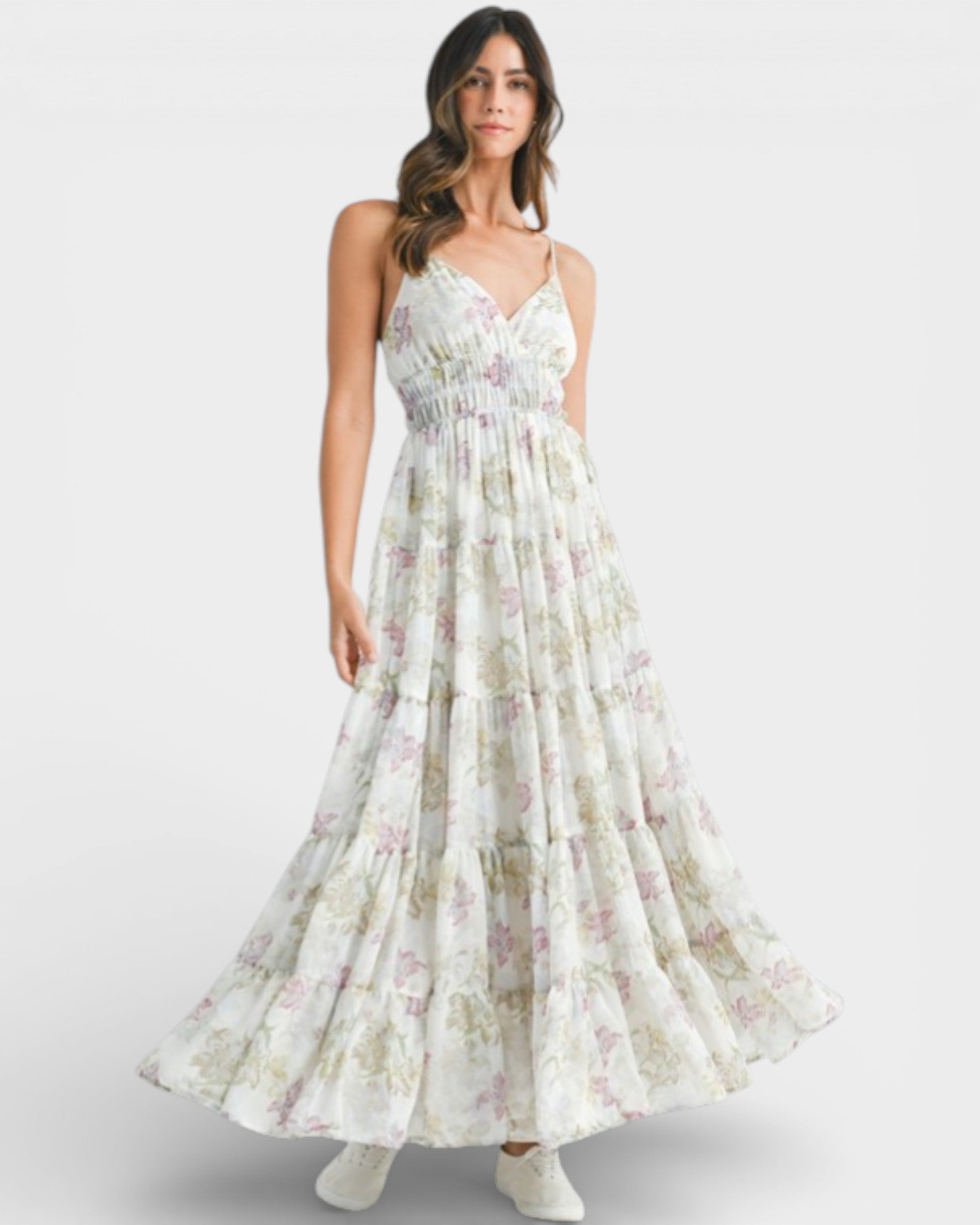Woman wearing a floral dress on a white background