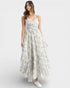 Woman wearing a floral dress on a white background