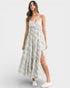 Woman wearing a floral dress with a white background