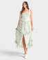 Woman wearing a floral dress on a white background