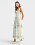 Woman wearing a floral dress on a white background