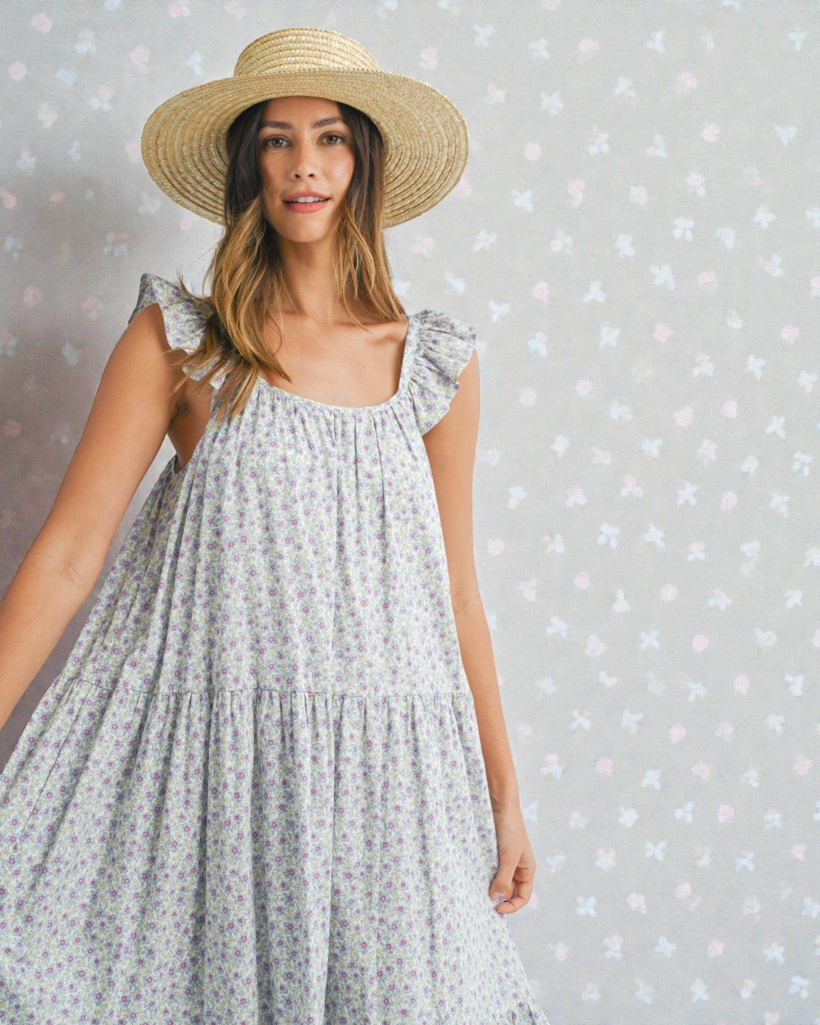 Robe mi-longue à volants fleuris sans manches en bleu