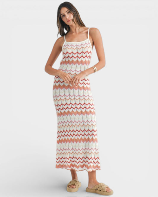 Woman wearing a striped dress on a white background