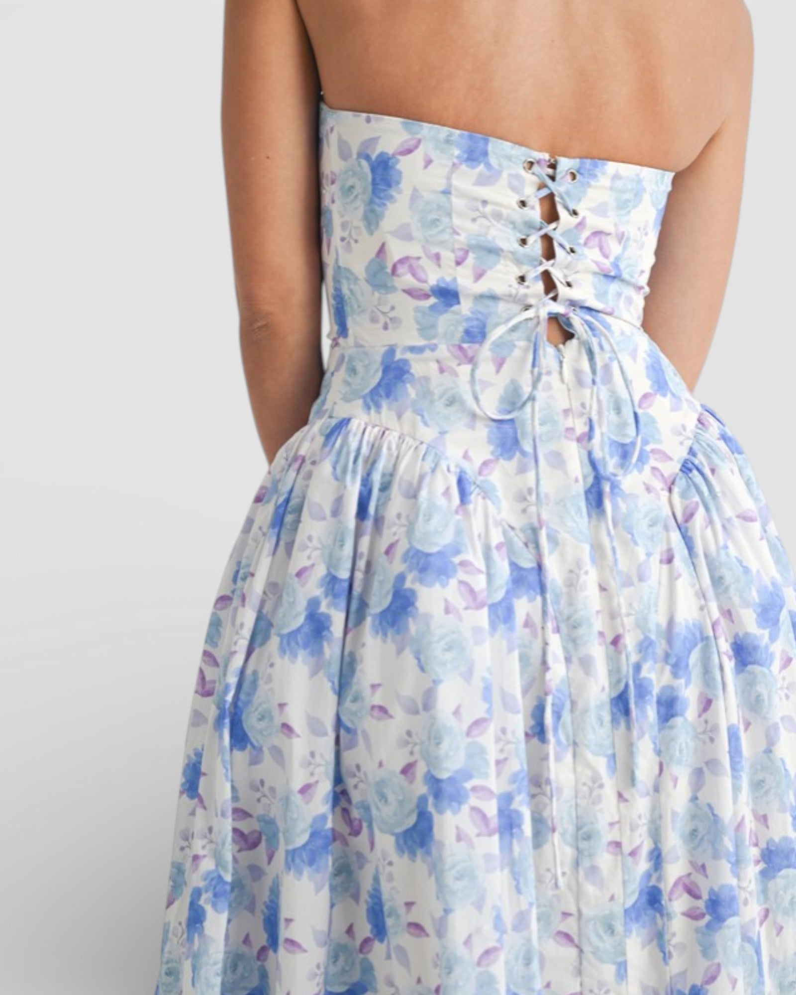 Strapless floral dress with a white background