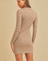 Woman wearing a ribbed beige dress against a beige background