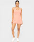 Woman wearing a pink dress on a white background
