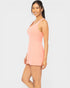 Woman wearing a pink dress on a white background