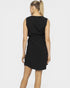 Woman wearing a black sleeveless dress on a white background