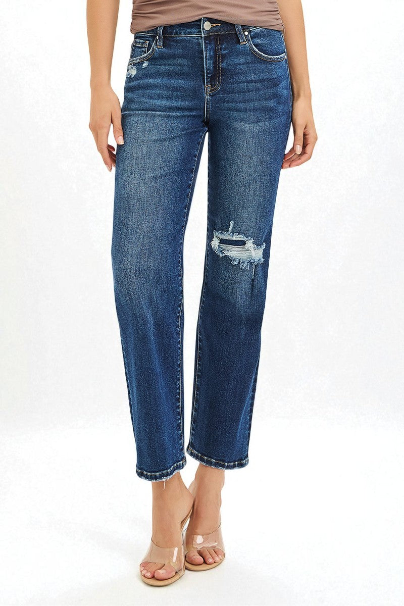 Blue jeans with a slight distressed look on a white background