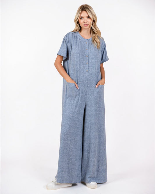 Woman wearing a blue dress on a white background