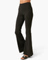 Black high-waisted flared pants shown on a model from the waist down, paired with black slide sandals against a clean white background.