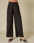 Black wide-leg pants worn by a person on a beige background