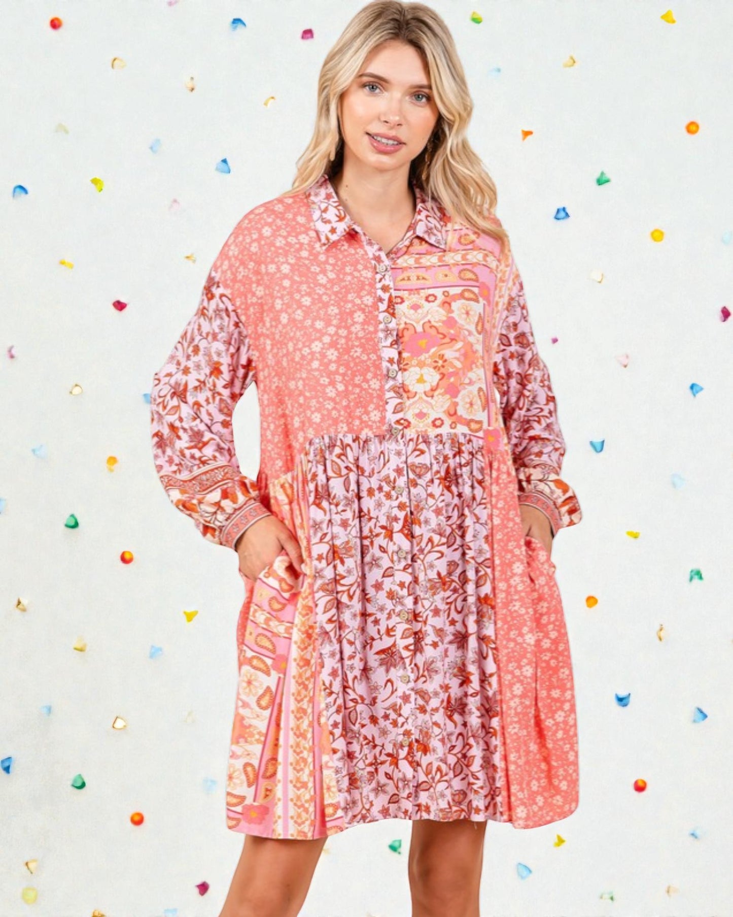 Woman wearing a floral patterned dress against a colorful polka dot background