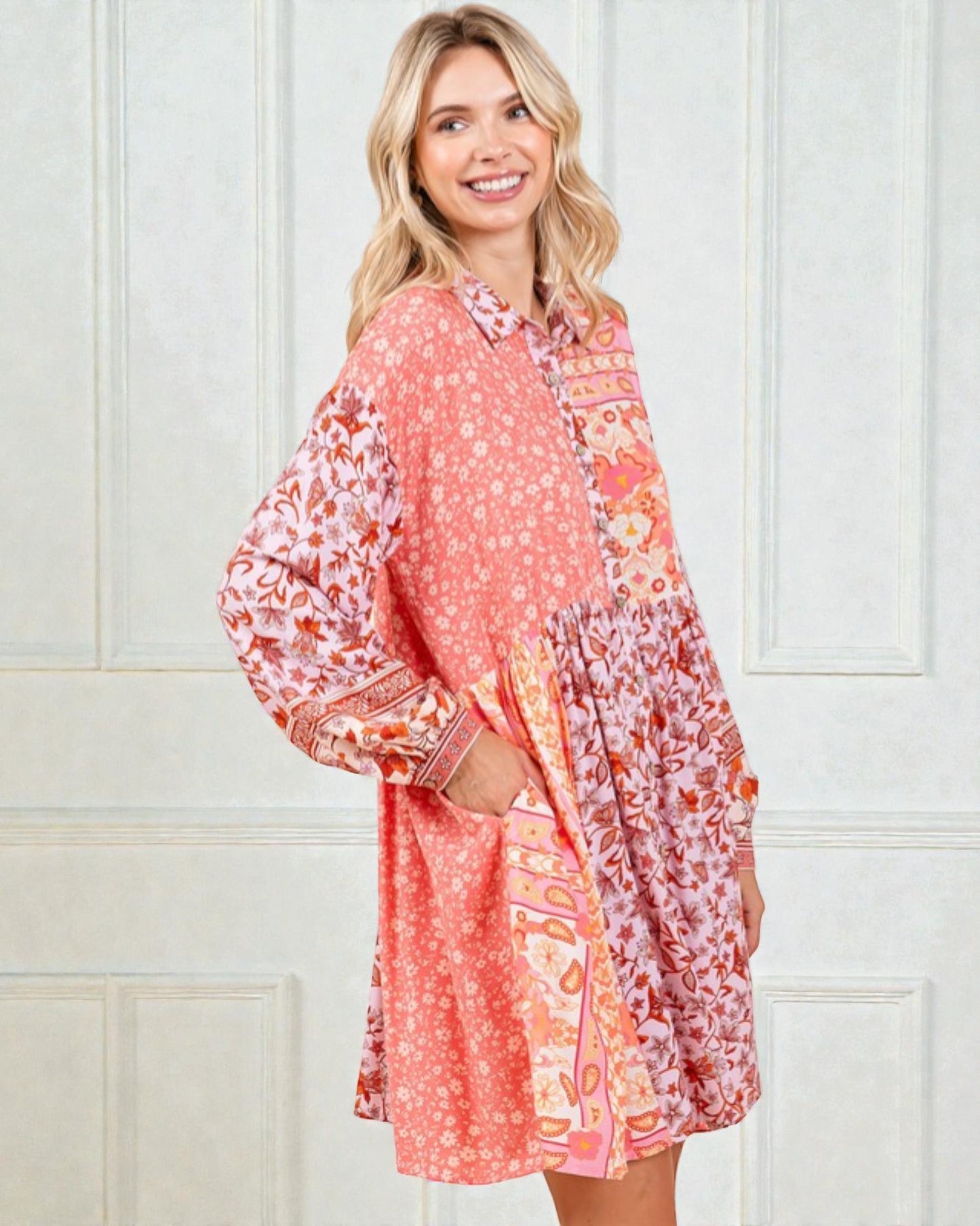 Woman wearing a floral dress with a white background