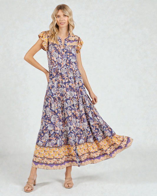 Woman wearing a floral dress on a white background