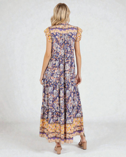 Woman wearing a floral dress with a white background