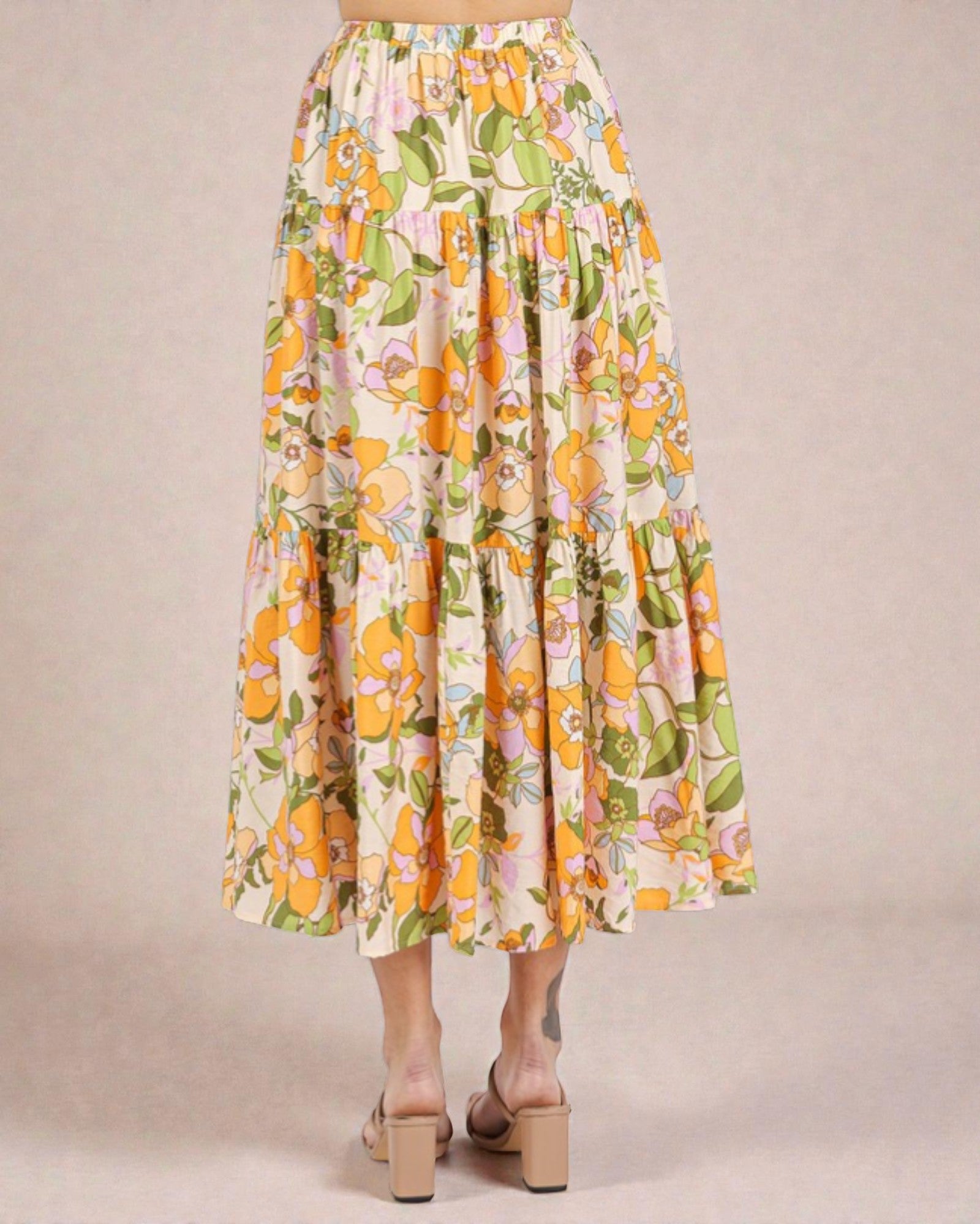 Floral patterned skirt on a plain background