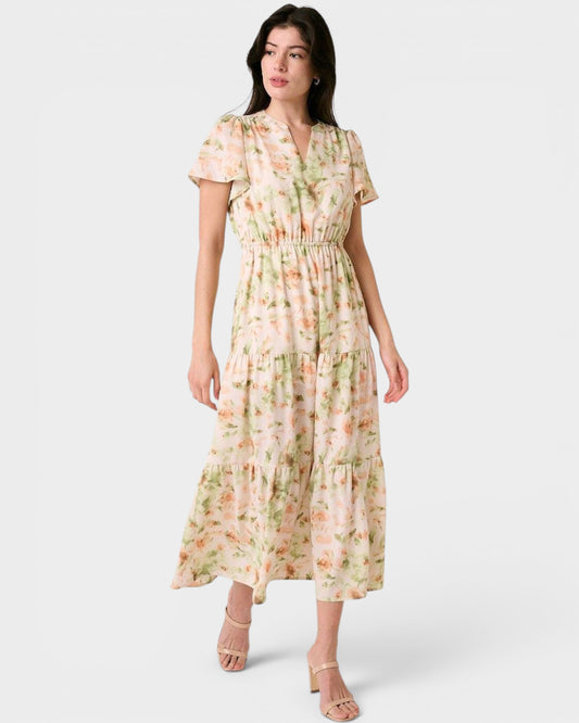 Woman wearing a floral dress on a white background