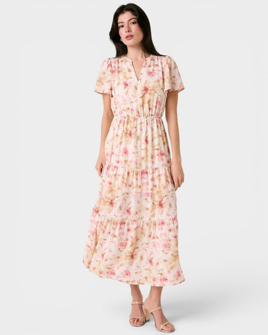 Woman wearing a floral dress on a white background