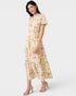 Woman wearing a floral dress on a white background