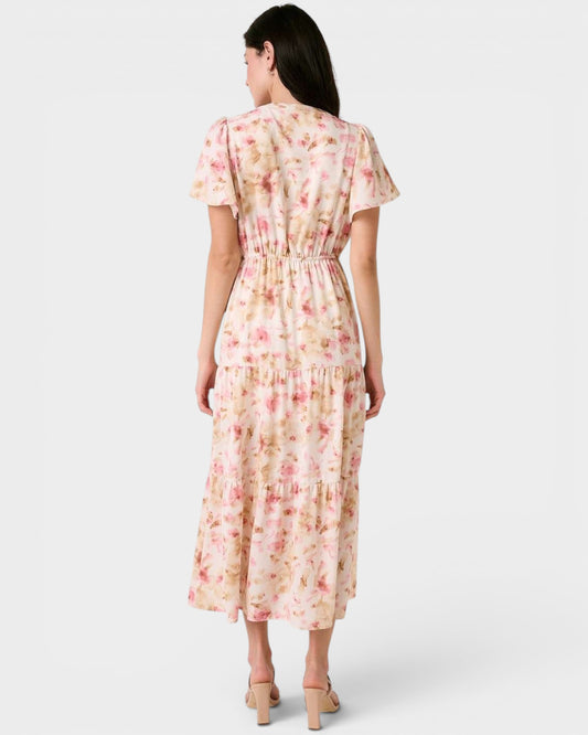 Woman wearing a floral dress on a white background