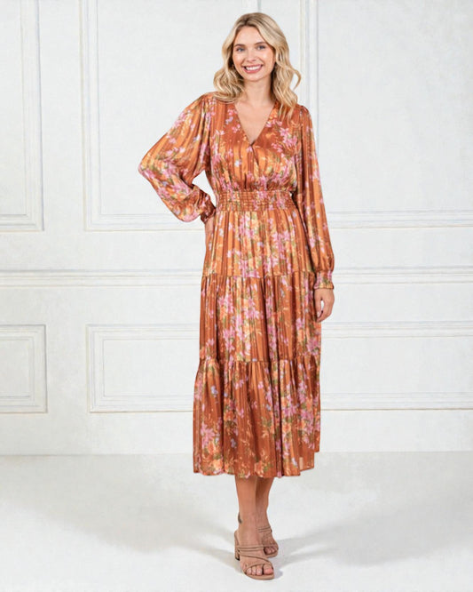 Woman wearing a floral dress with a white background